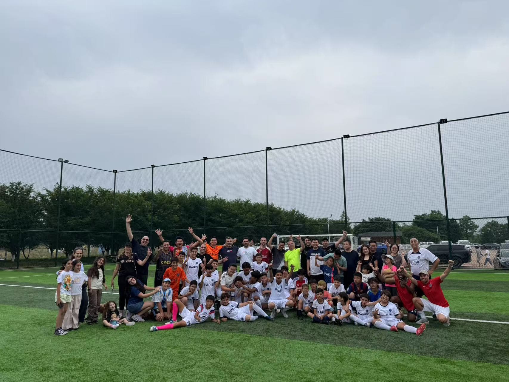 An intense football match in a packed stadium.