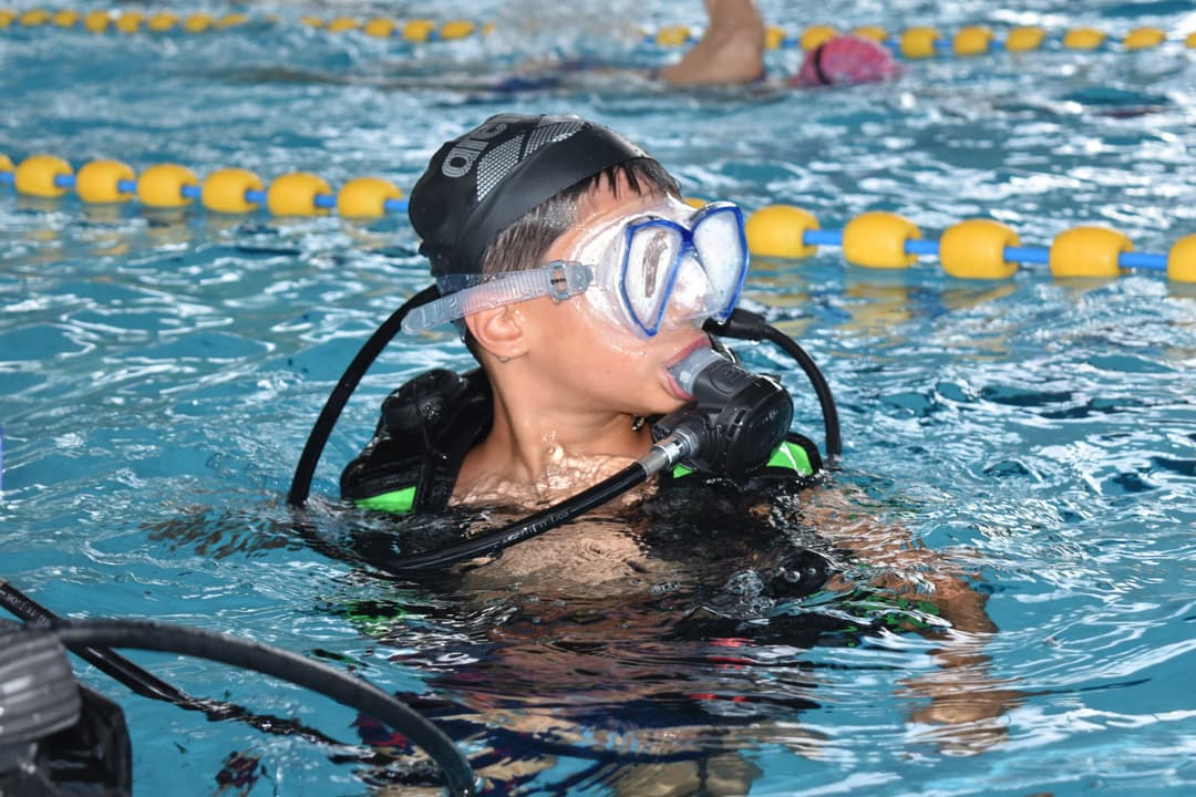 A scuba diver with a sea turtle.