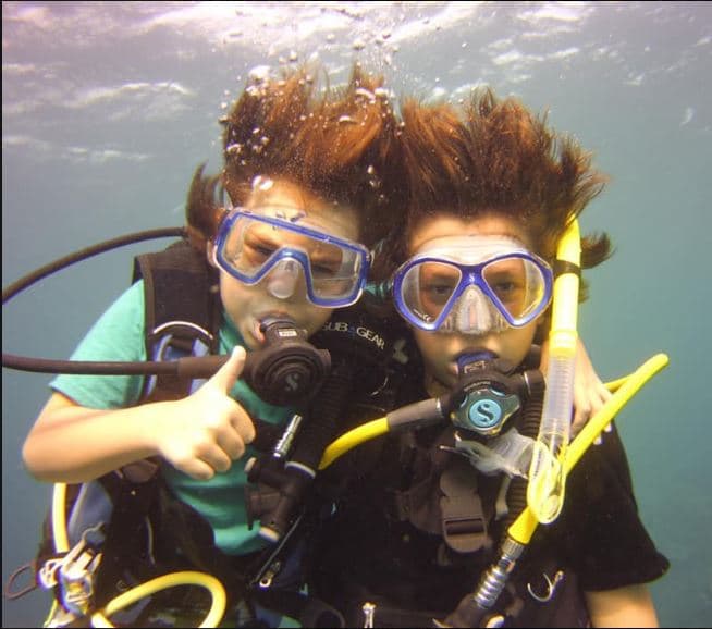 A scuba diver exploring a coral reef.