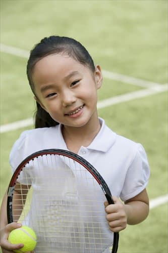 A tennis ball on the court.